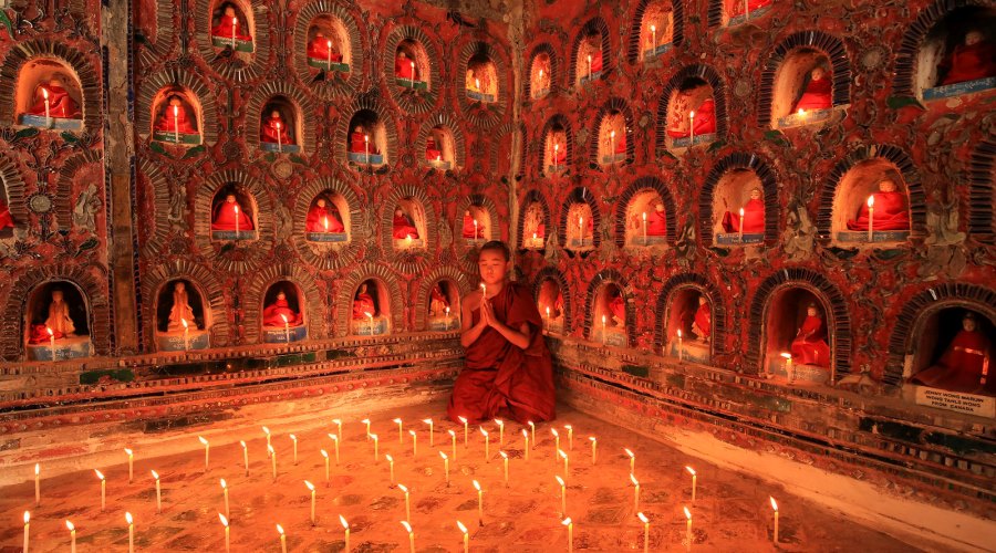 burmese monk praying